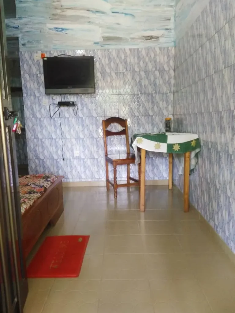 Aperçu de la chambre, gîte et restaurant à Kpalimé